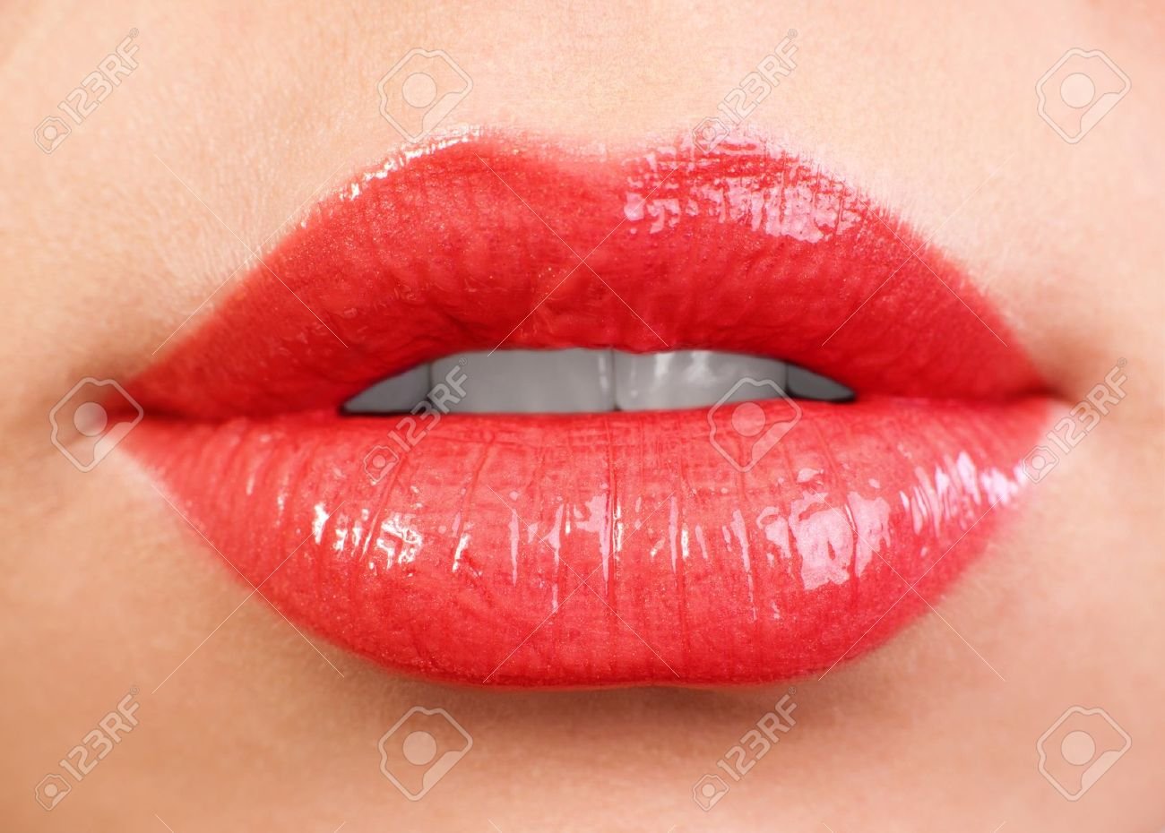 13963127-female-lips-close-up-red-color